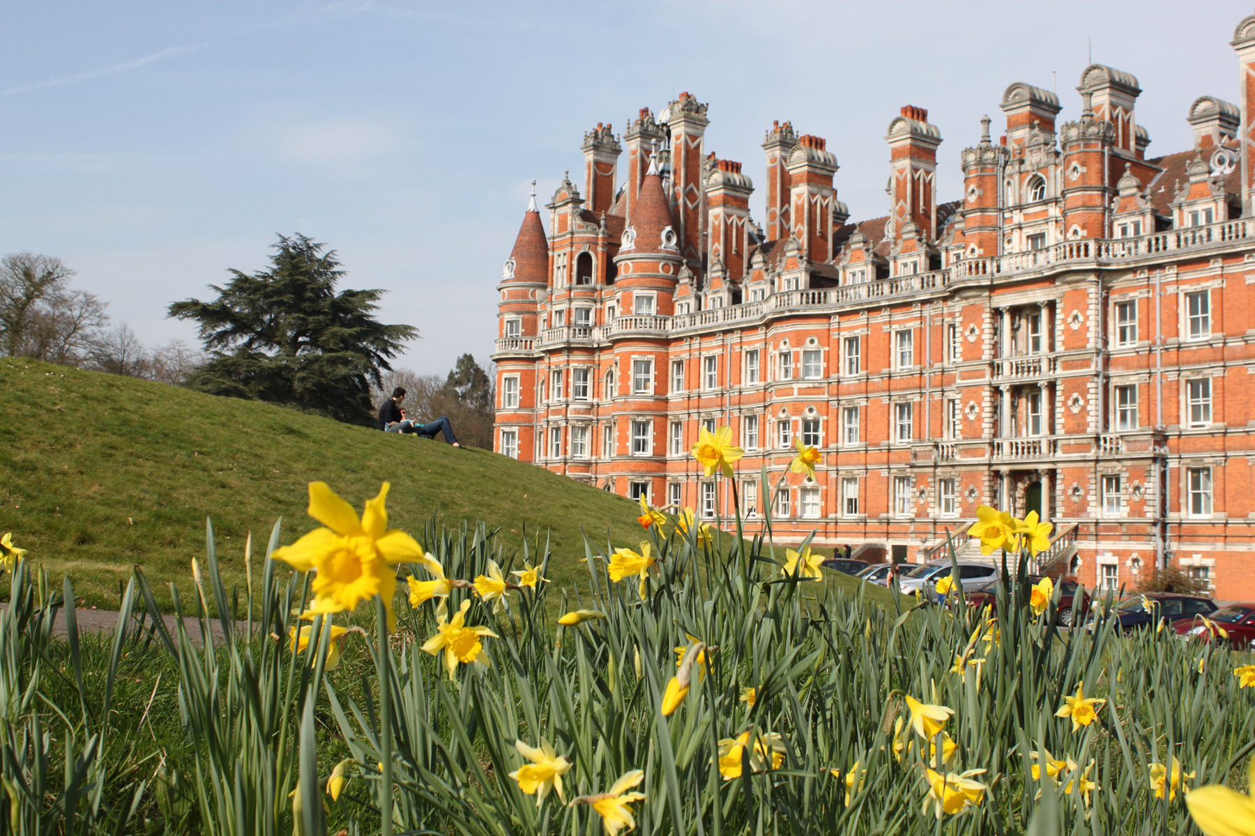 Founder's Building with daffodils from Founder's Field