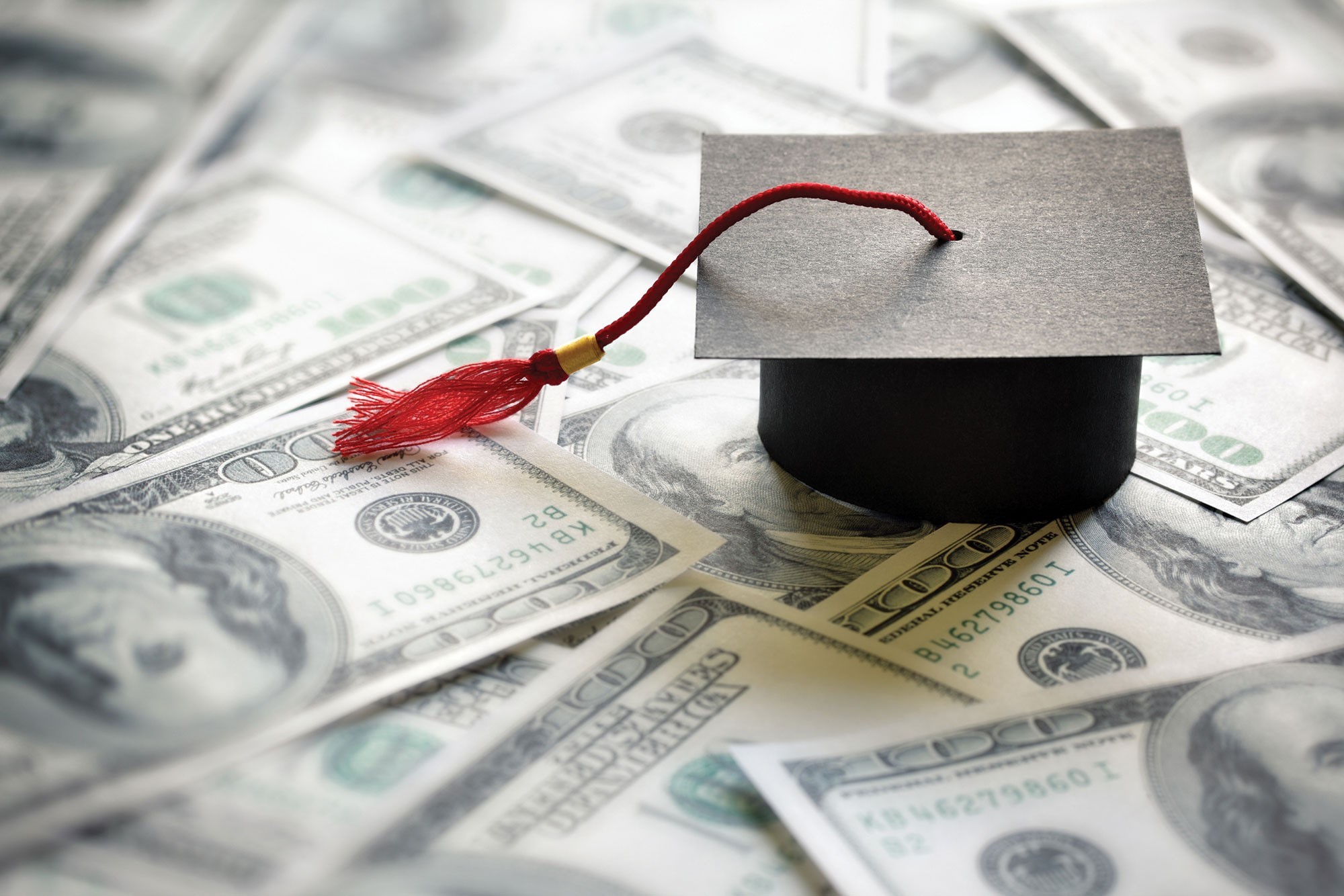 US-money-and-a-mortar-board-hat