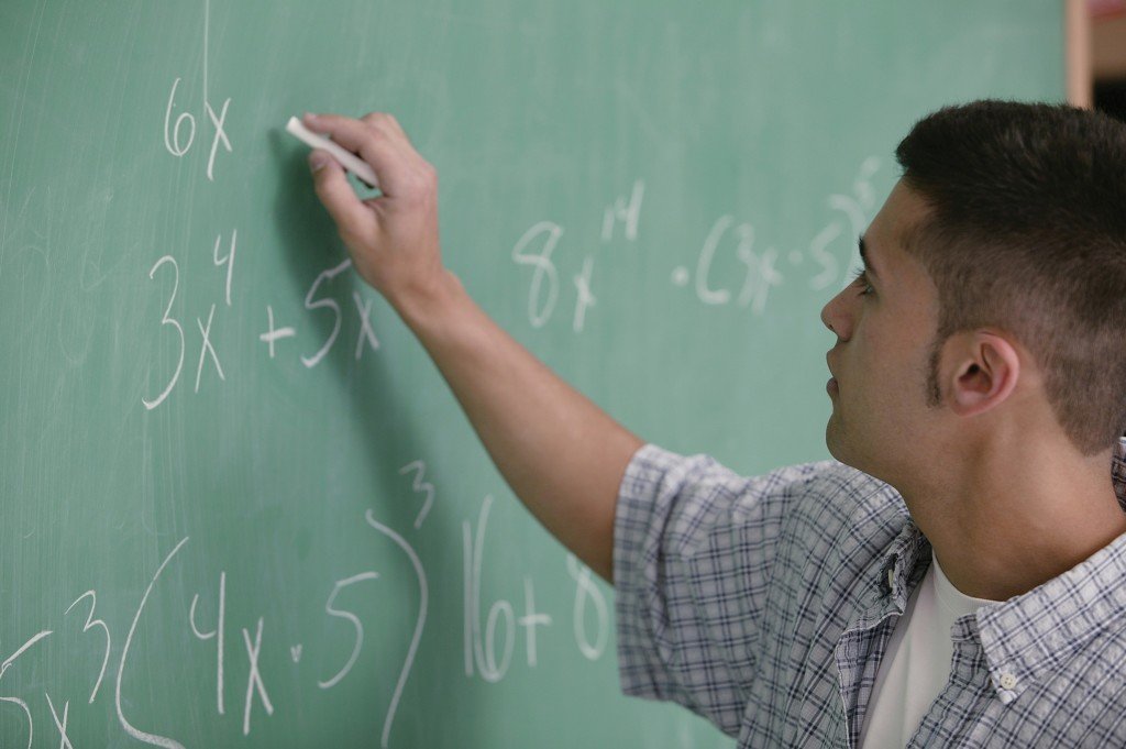 Doing maths at the blackboard